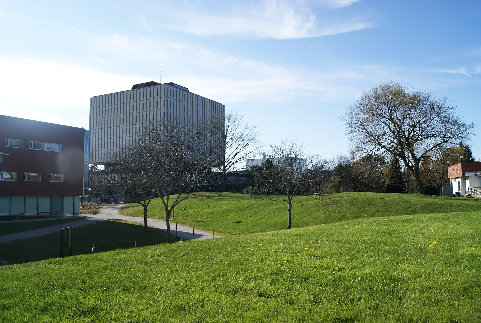 Open lawns and library tower on the University of Waterloo campus